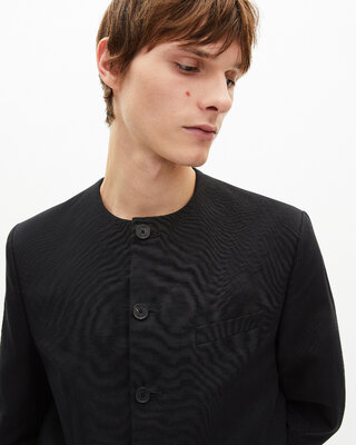 Black collarless jacket