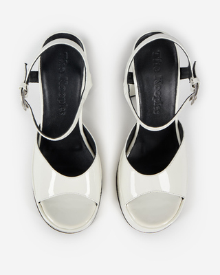 White patent leather heeled sandals