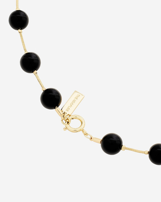 Pearl necklace with black heart pendant