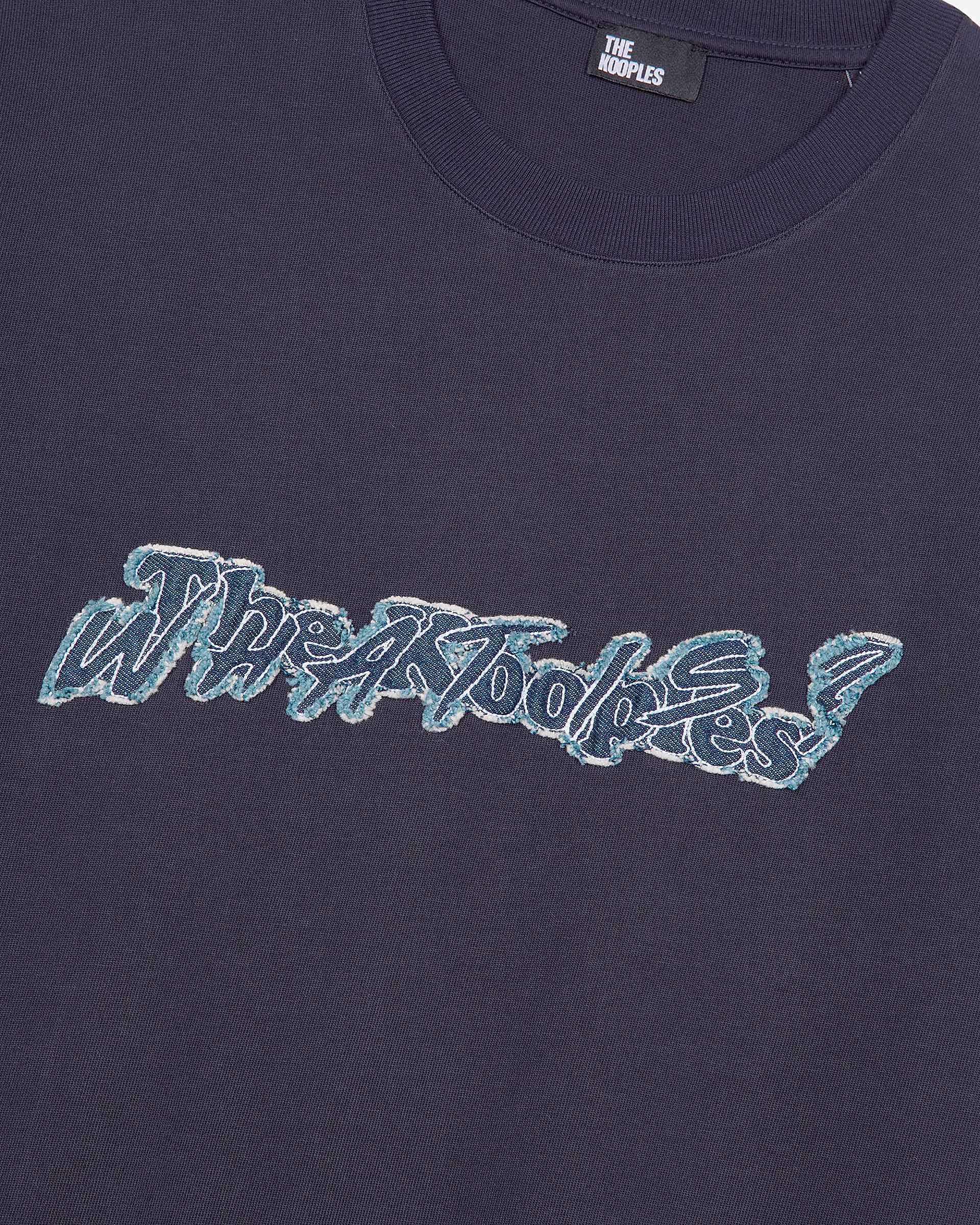 What Is navy denim patch t-shirt