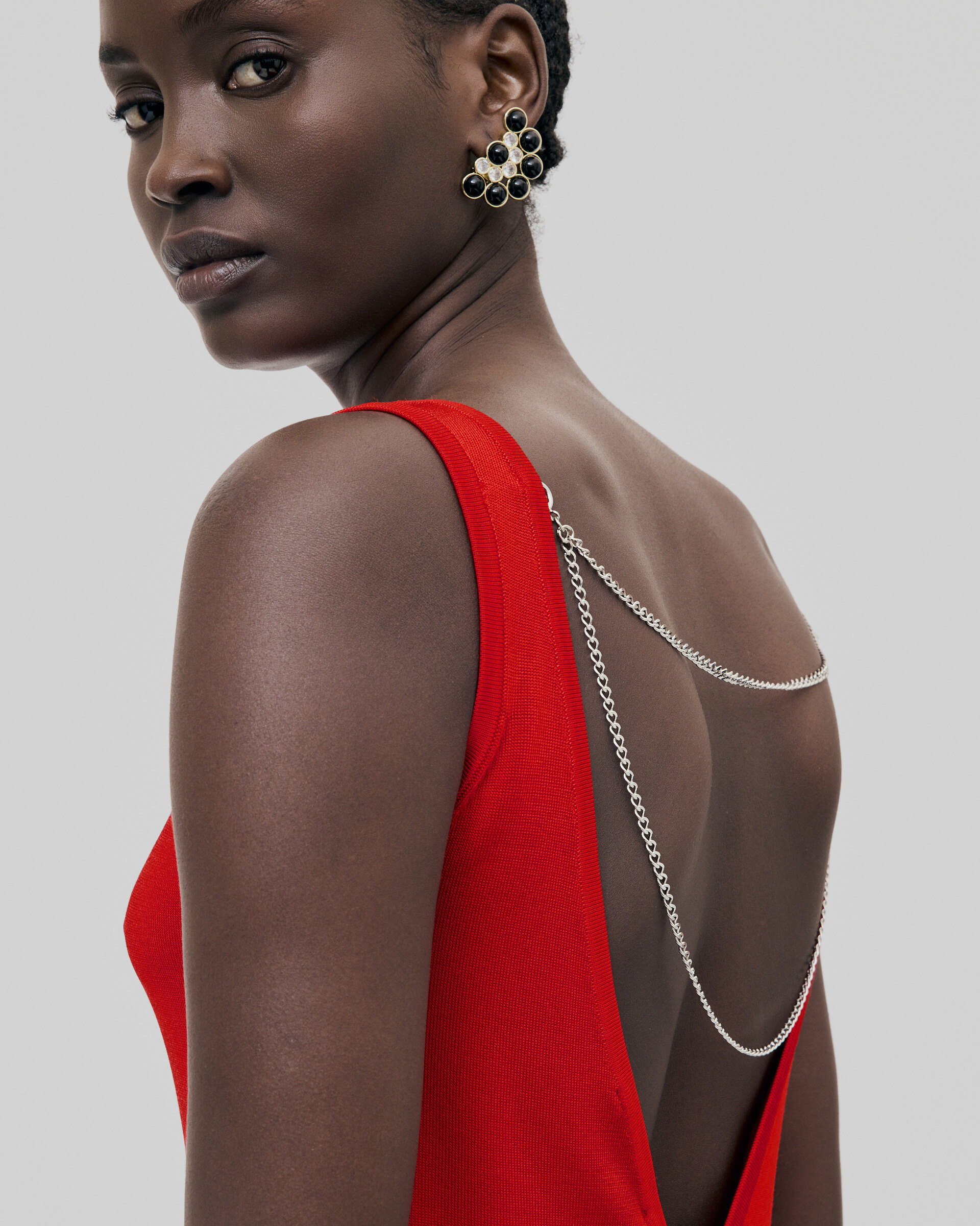Mesh top with red chains