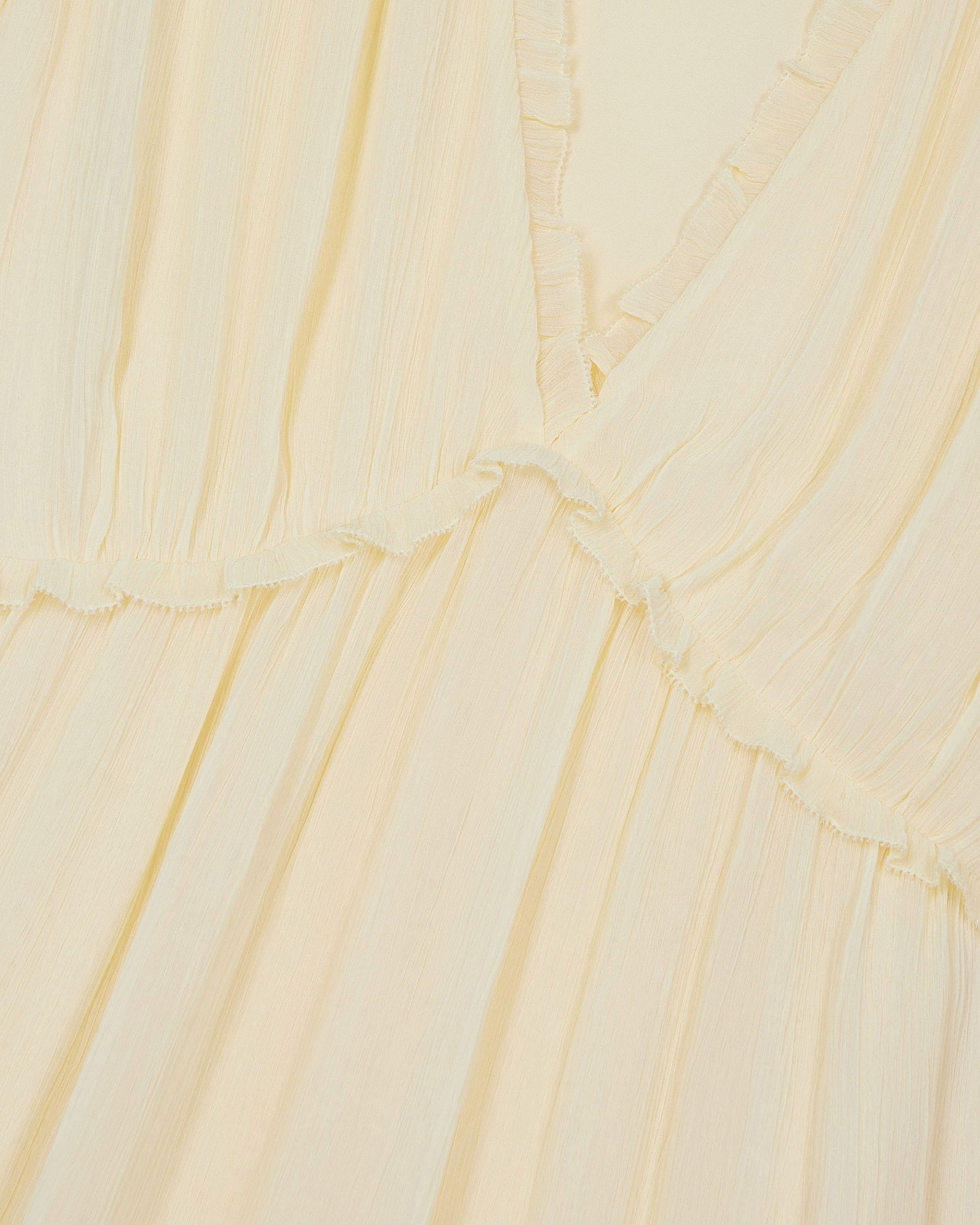 Short yellow ruffled dress