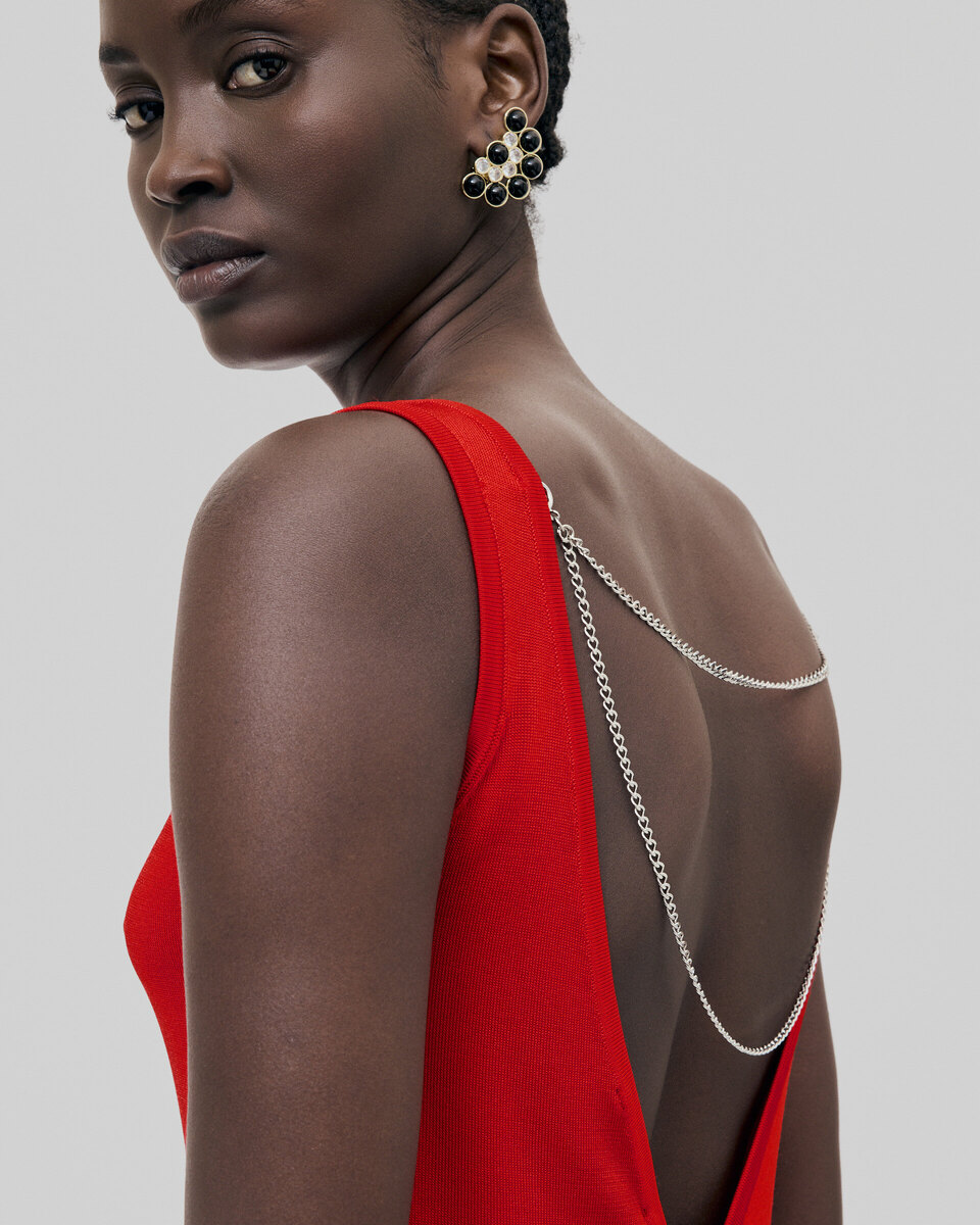 Mesh top with red chains