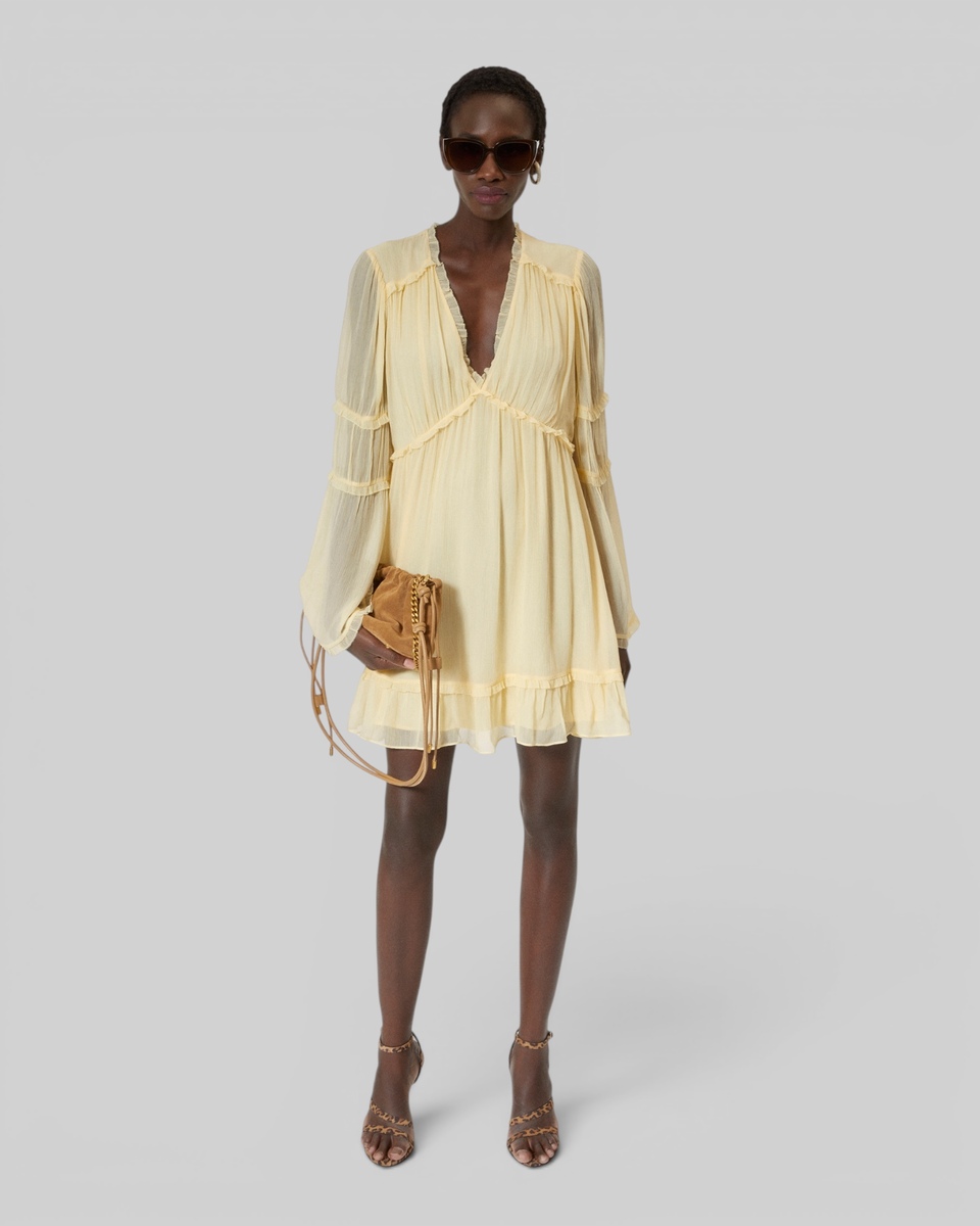Short yellow ruffled dress