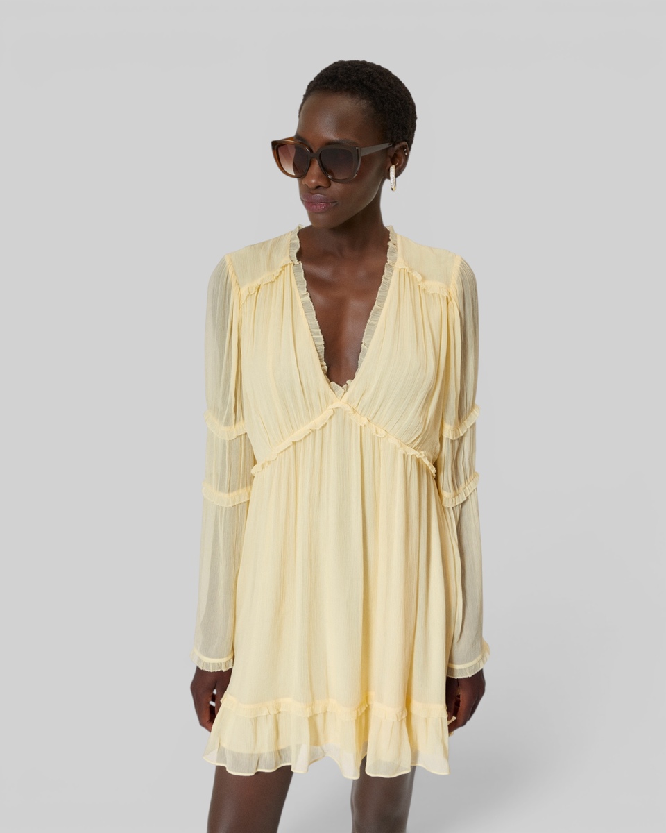 Short yellow ruffled dress