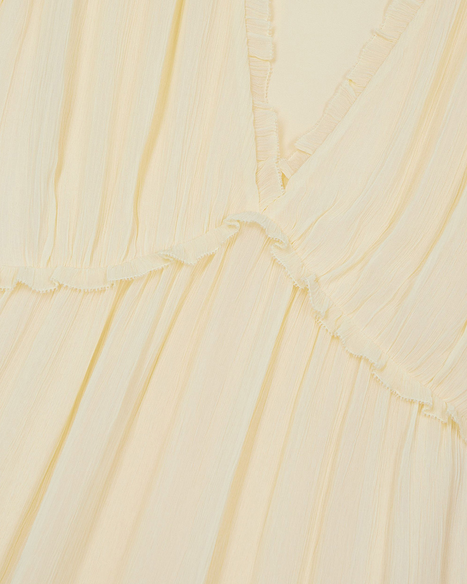Short yellow ruffled dress