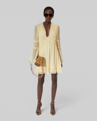 Short yellow ruffled dress
