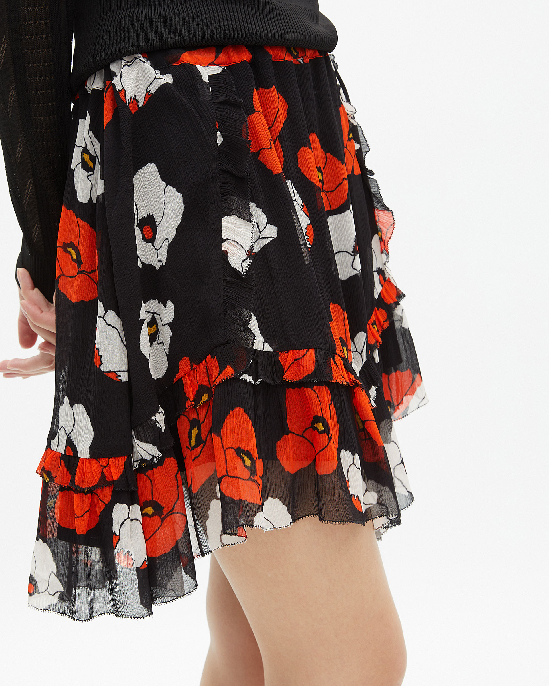 Short black floral print skirt