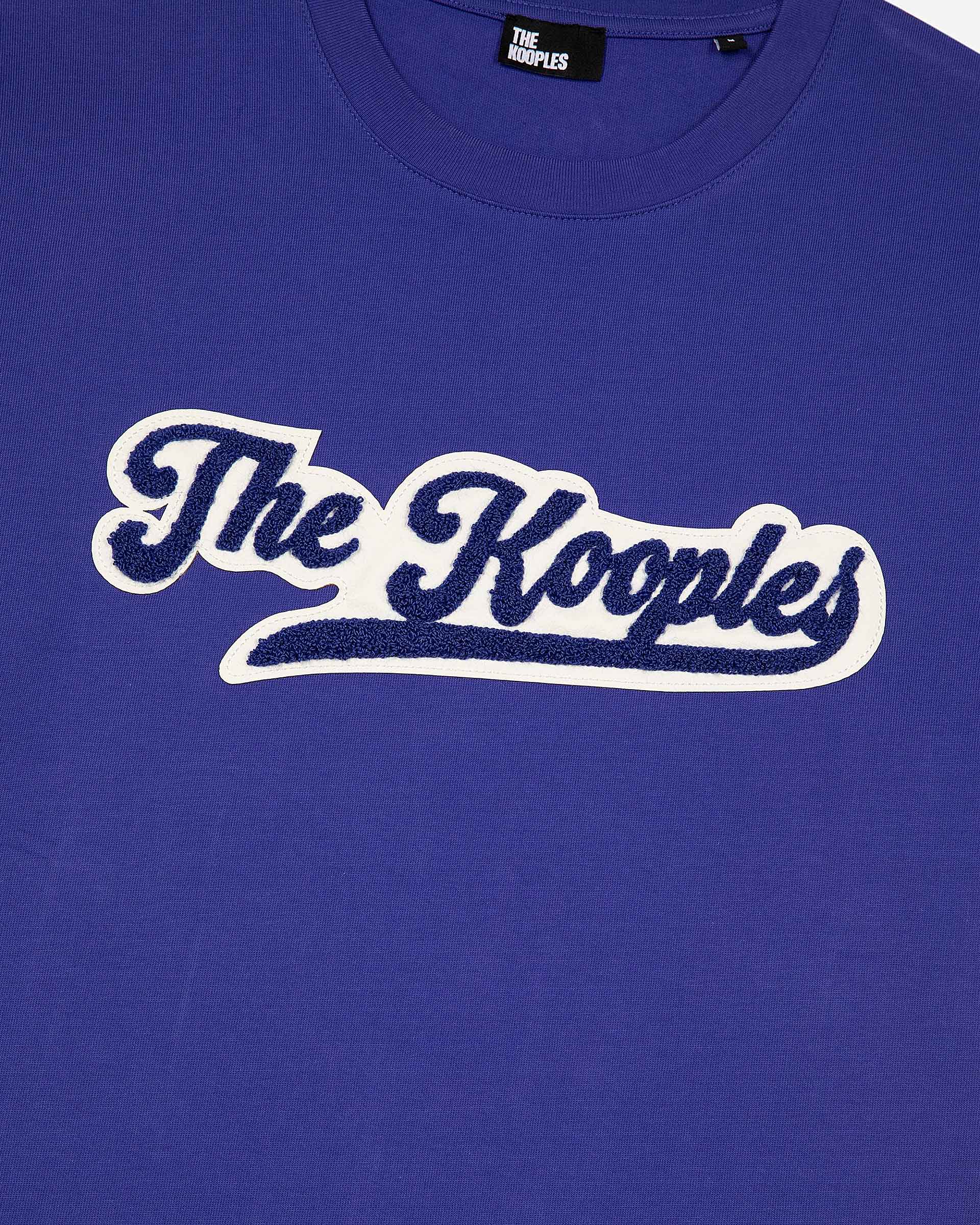 T-shirt with blue patch