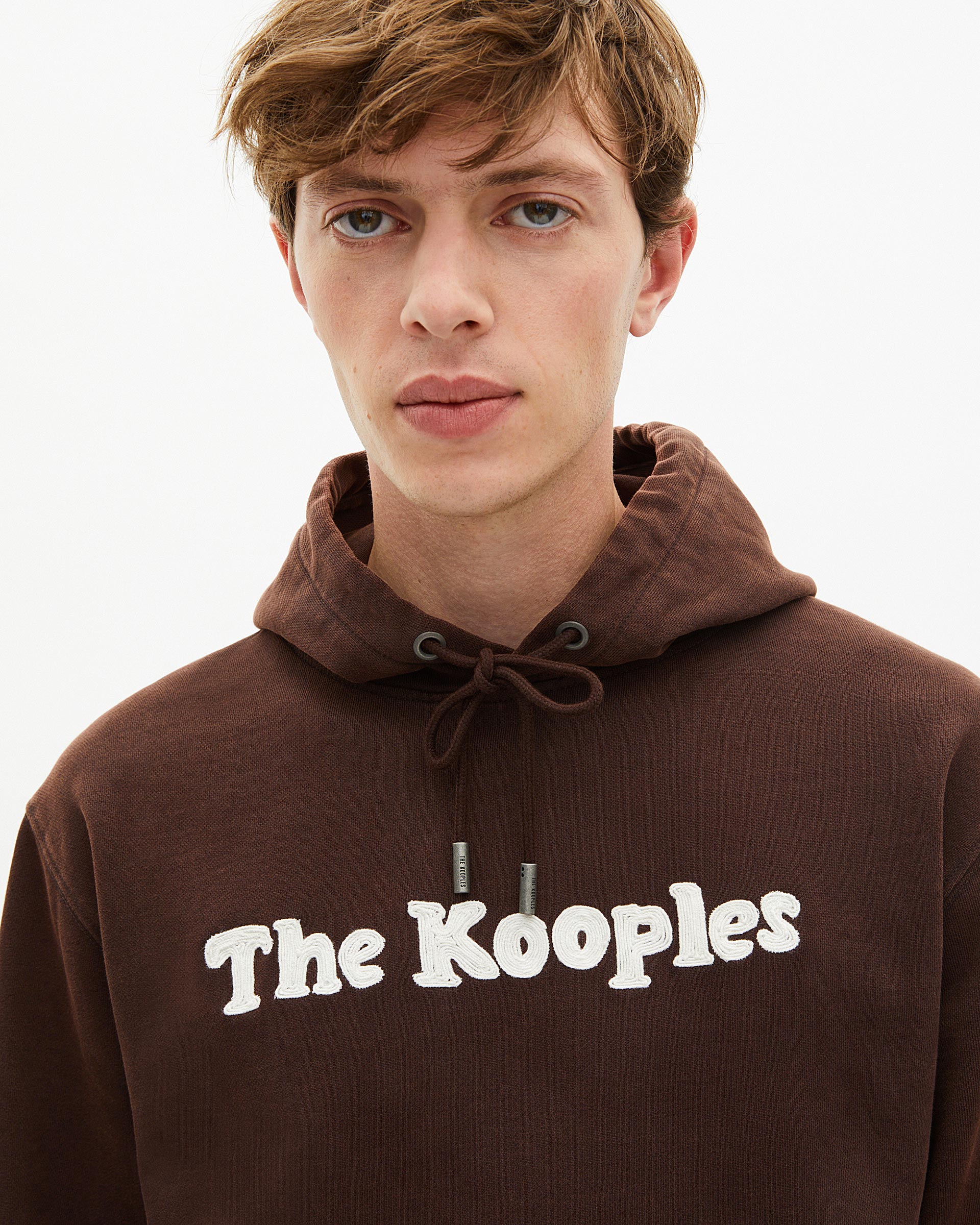 Hooded sweatshirt with brown embroidery