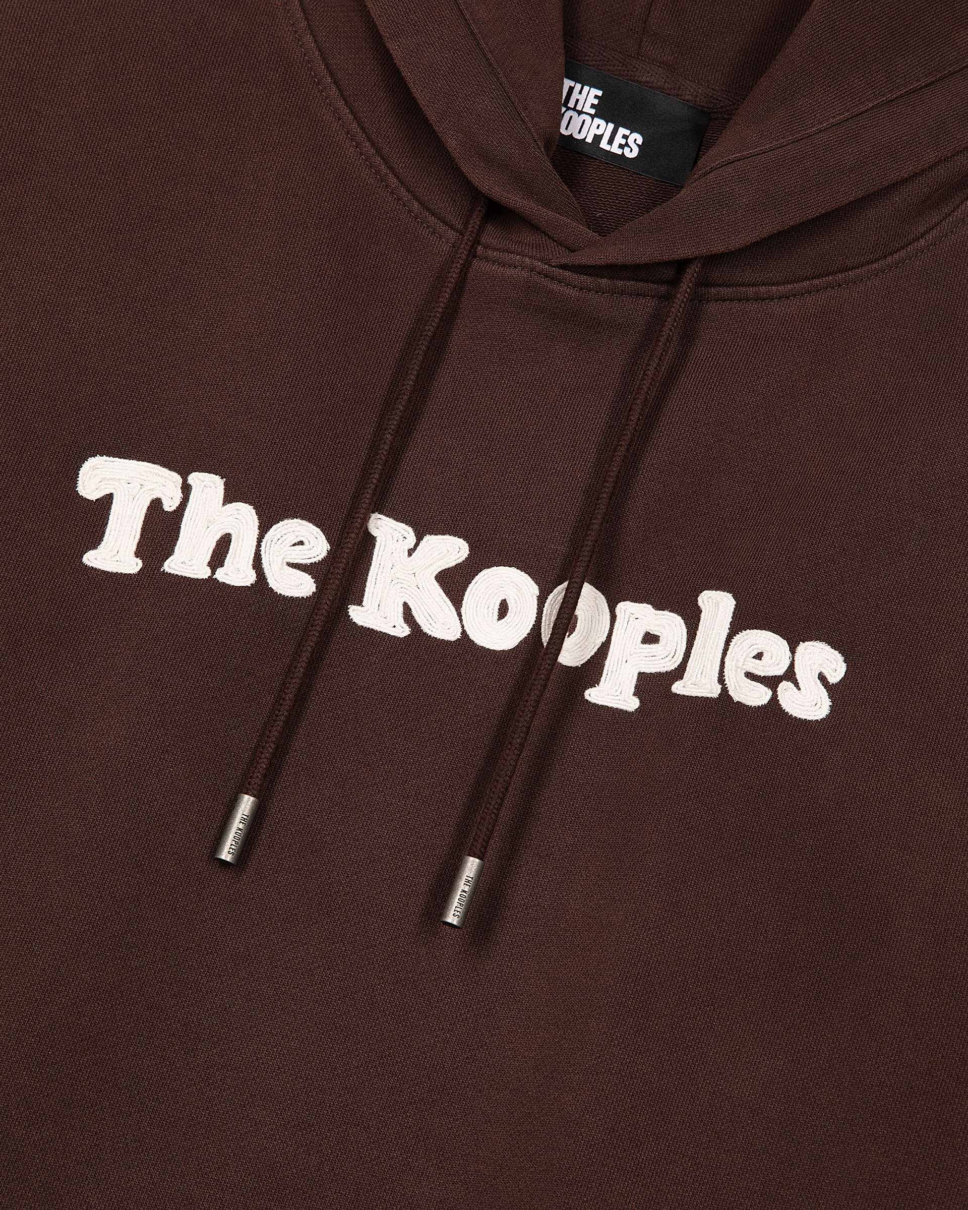 Hooded sweatshirt with brown embroidery