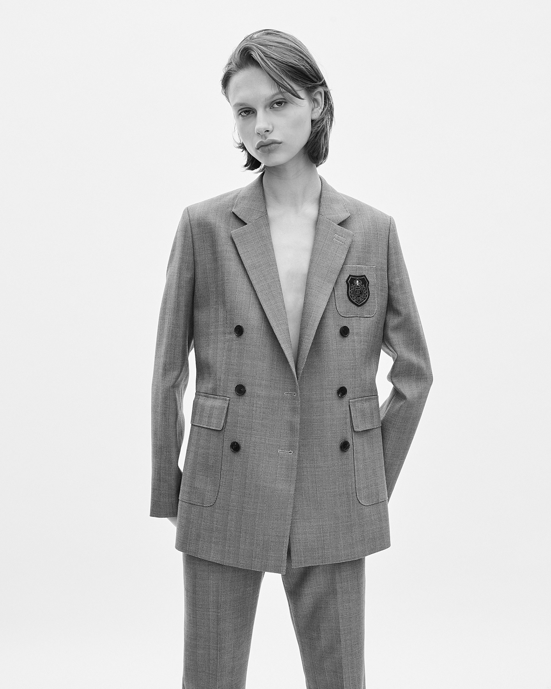 Double-breasted wool suit jacket with camel coat of arms