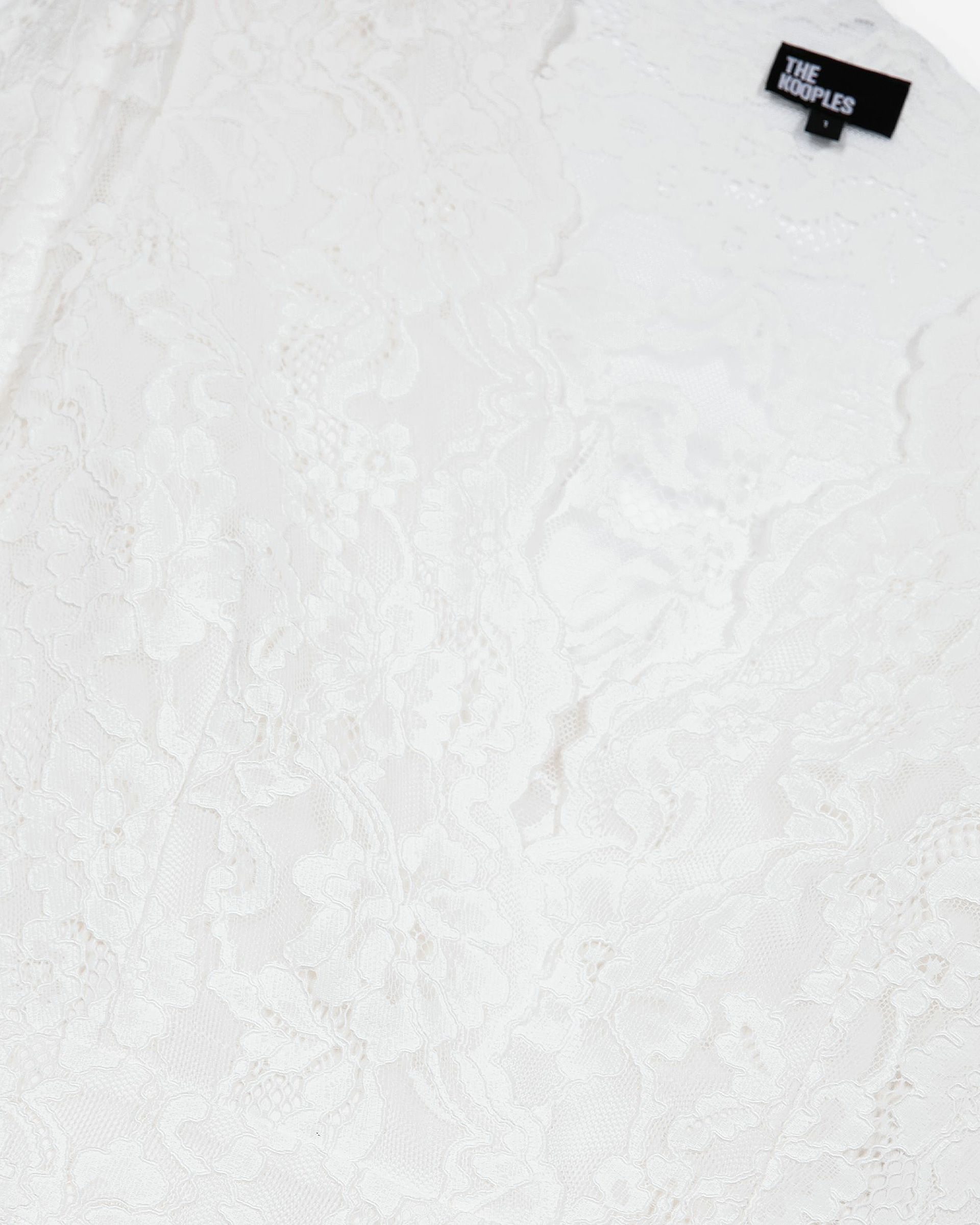 White lace flared sleeve top