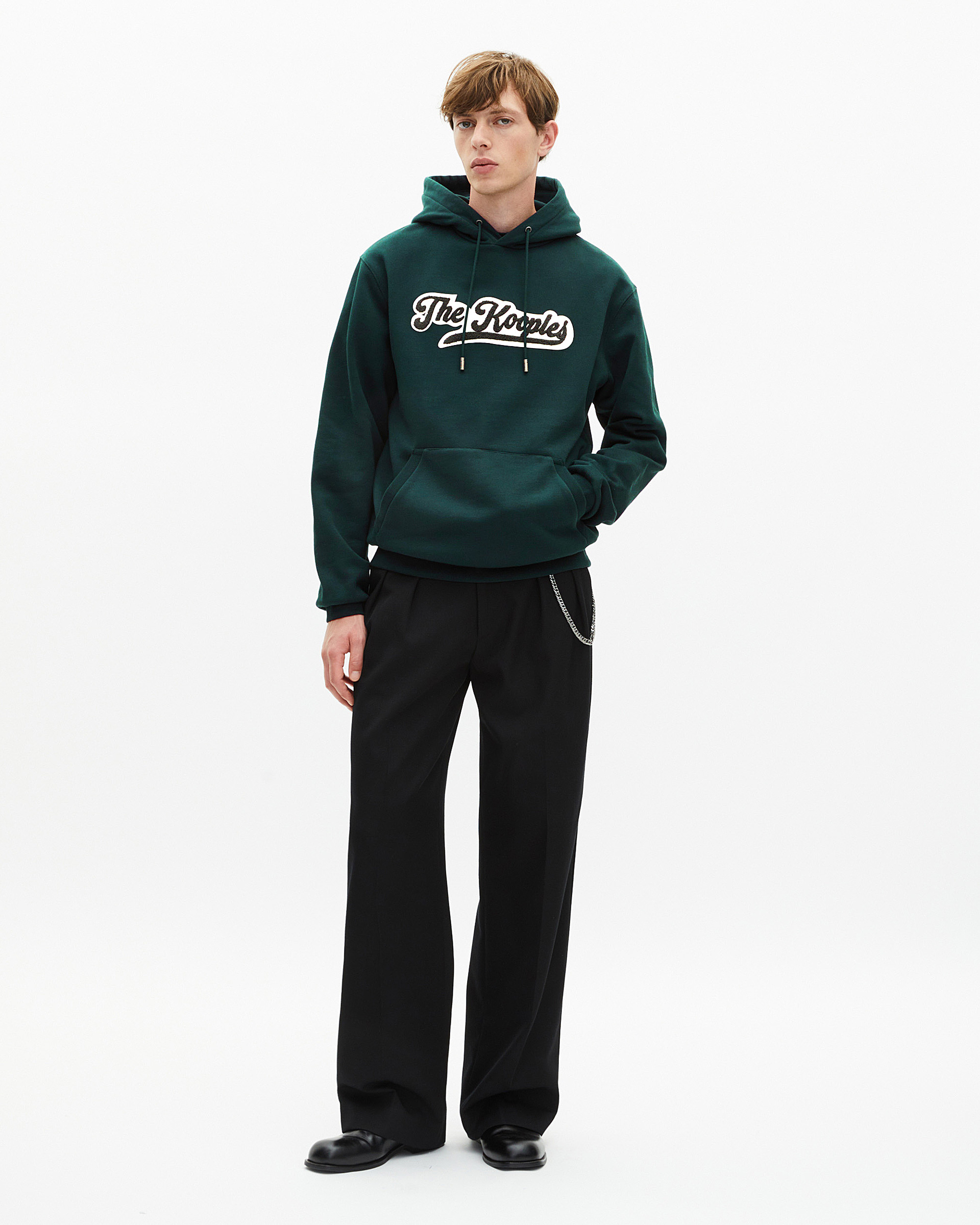 Hooded sweatshirt with dark green patch