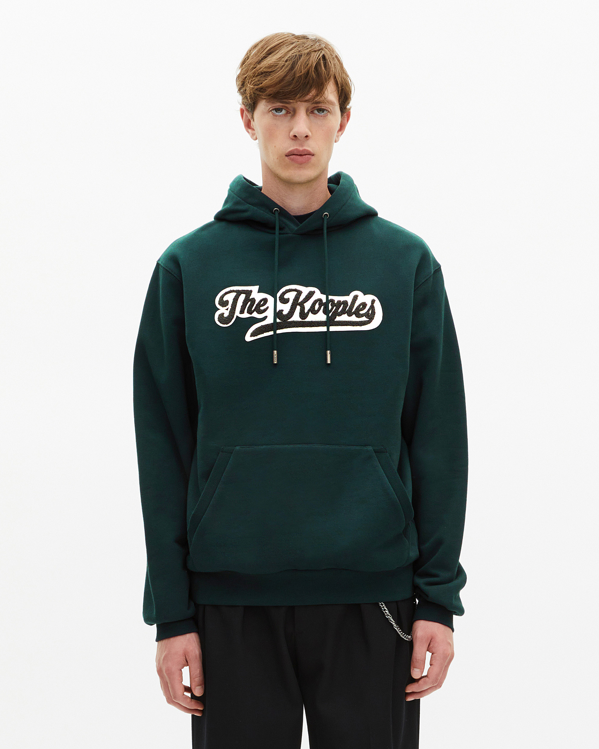 Hooded sweatshirt with dark green patch