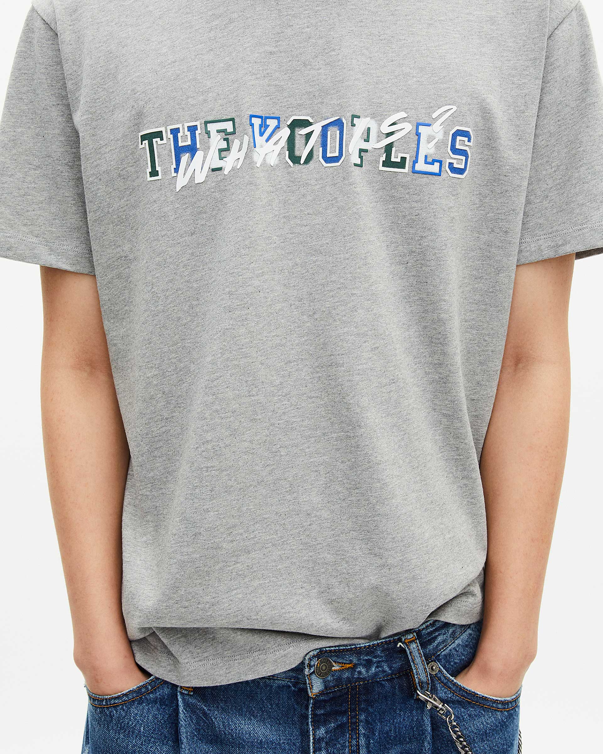 What is grey T-shirt