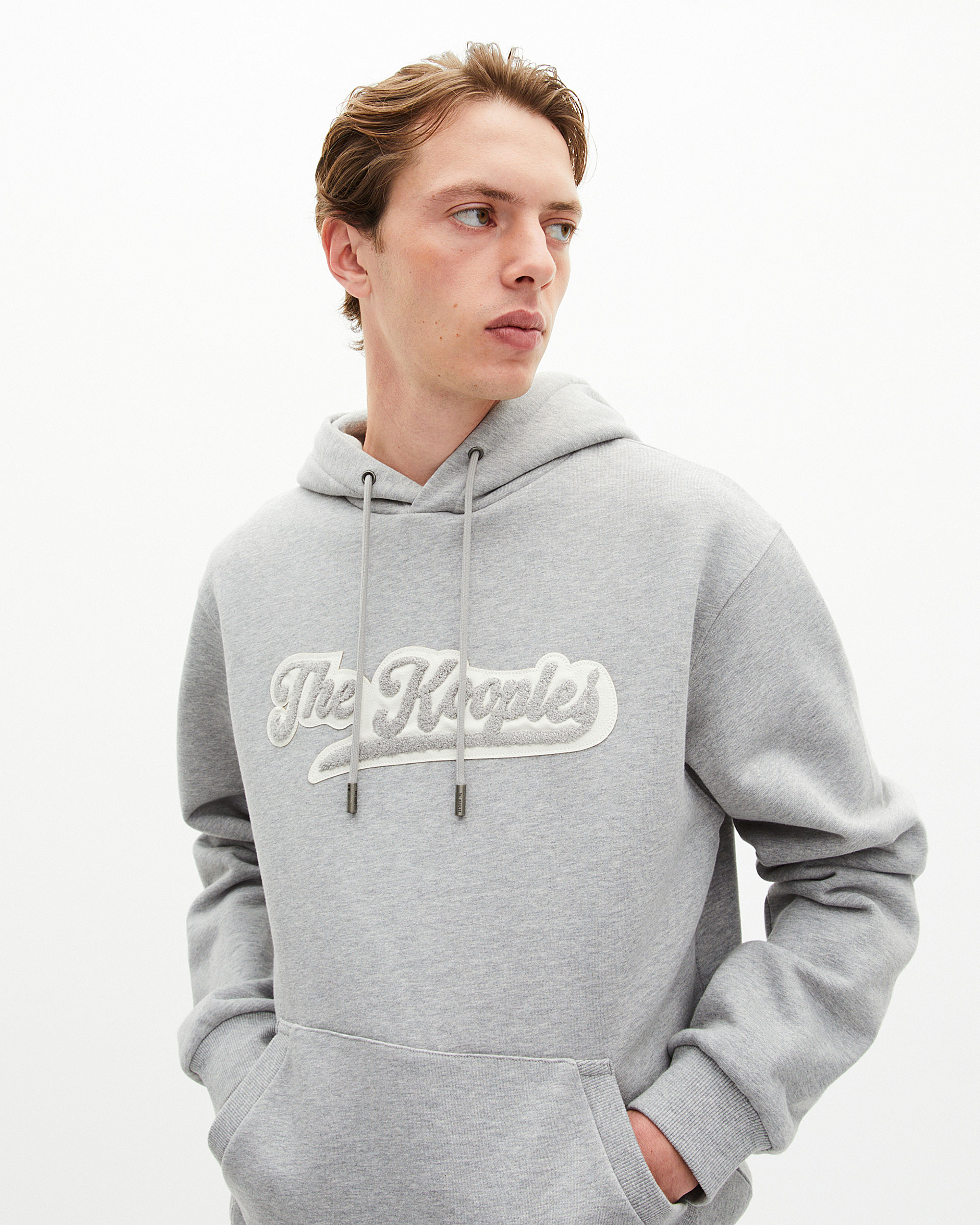Hooded sweatshirt with grey patch