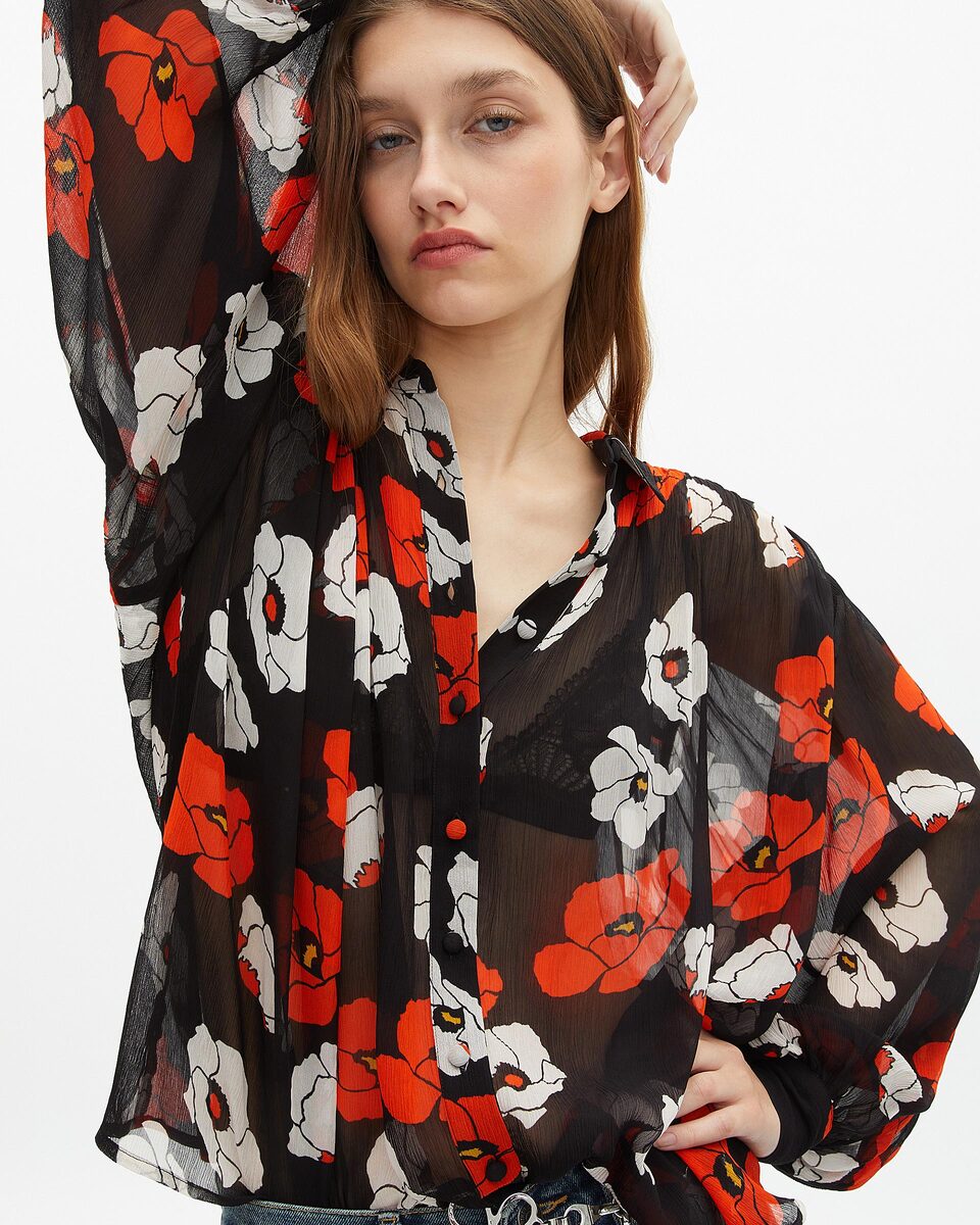 Loose-fitting black floral print shirt