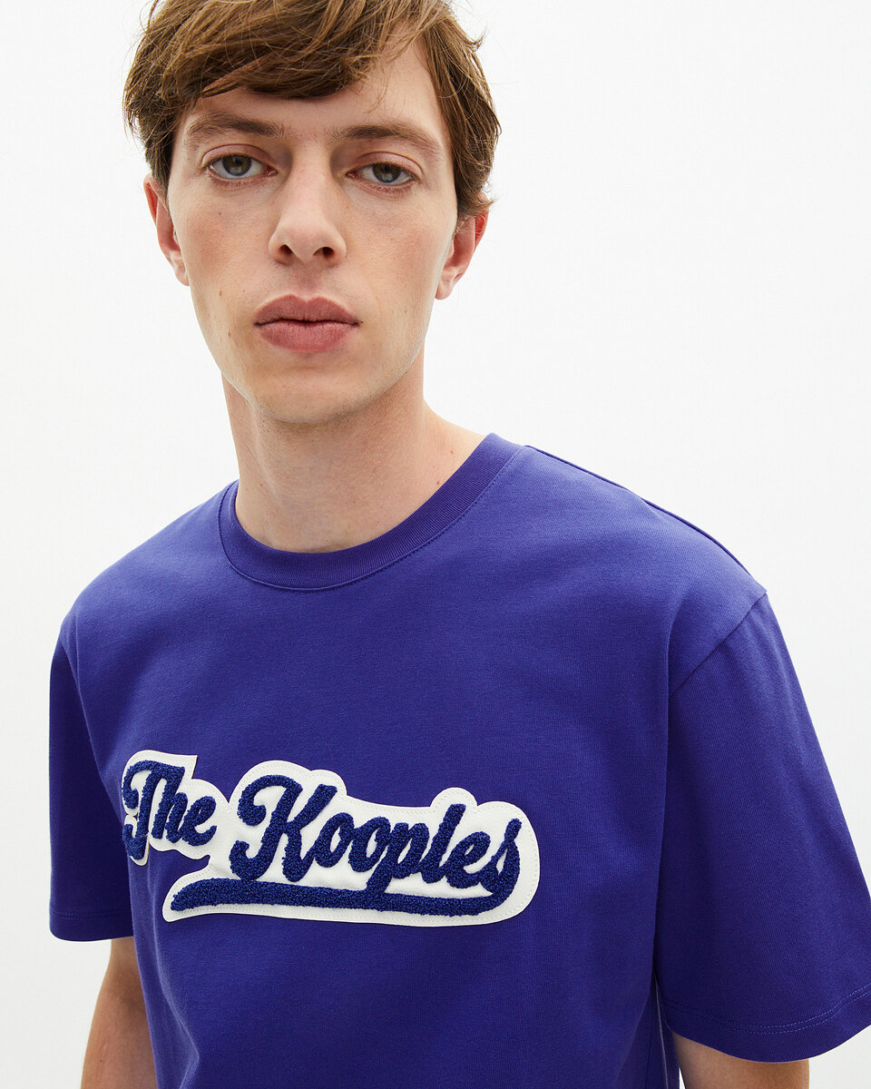 T-shirt with blue patch