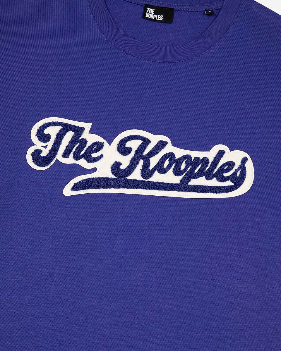 T-shirt with blue patch