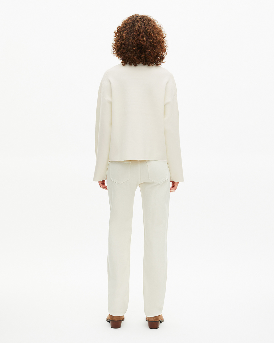 White mock-neck sweater