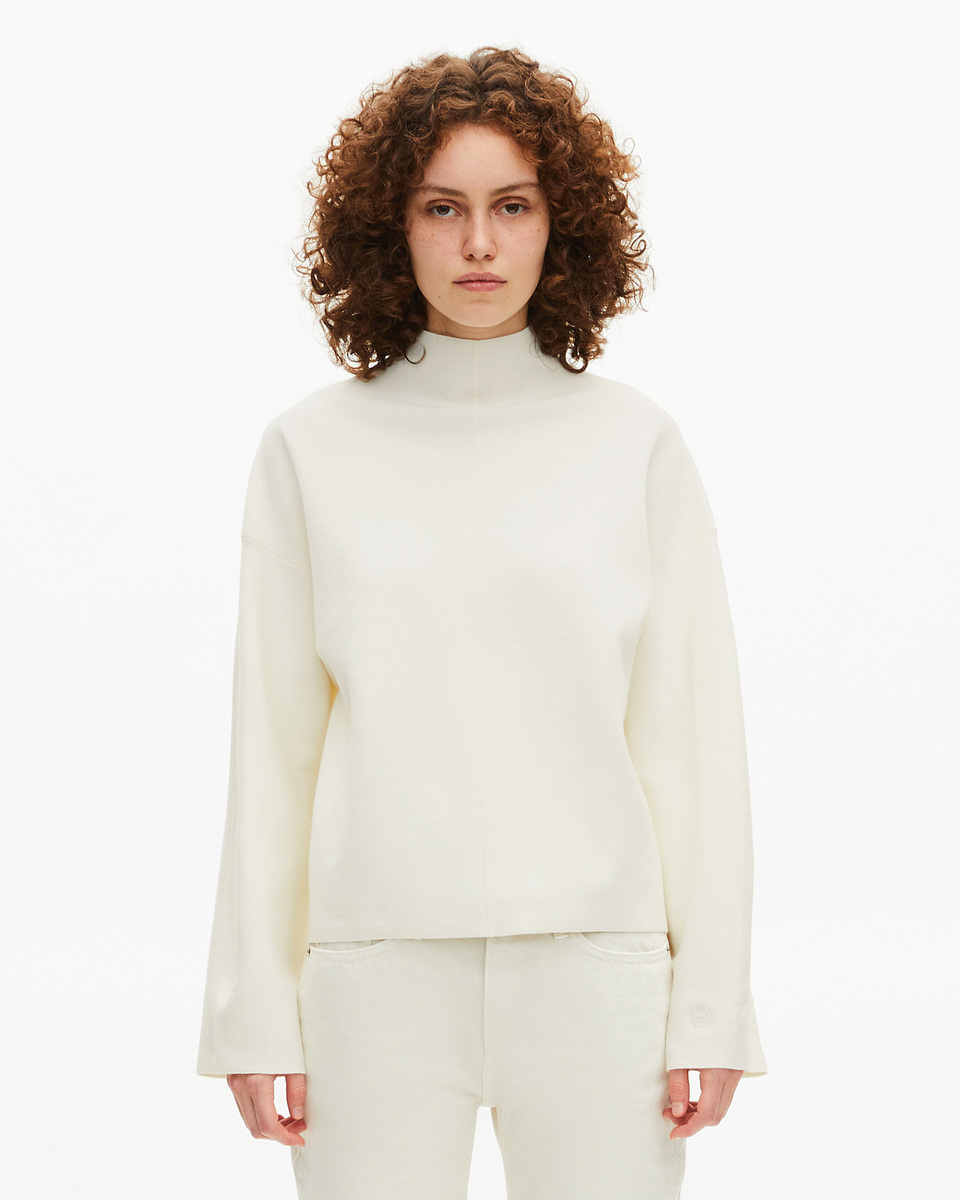 White mock-neck sweater