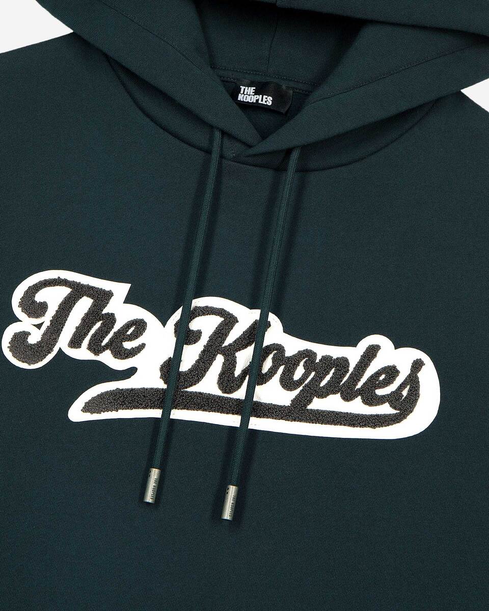 Hooded sweatshirt with dark green patch