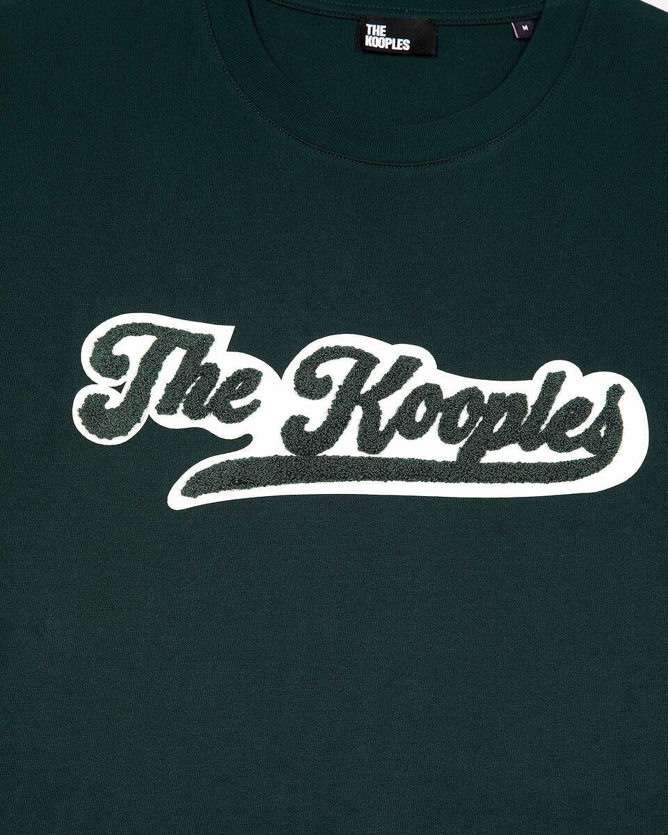 T-shirt with dark green patch