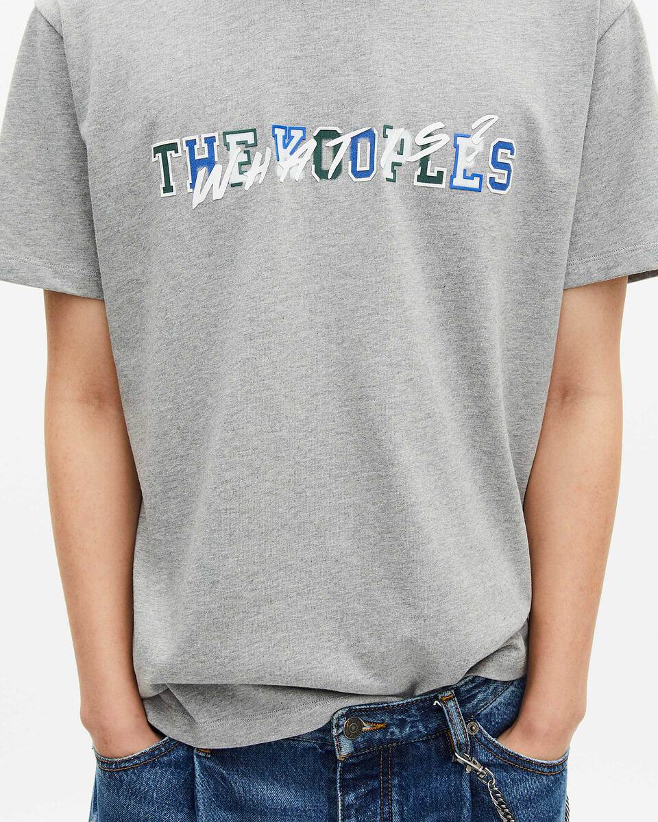 What is grey T-shirt