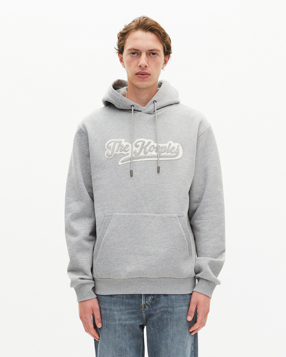 Hooded sweatshirt with grey patch