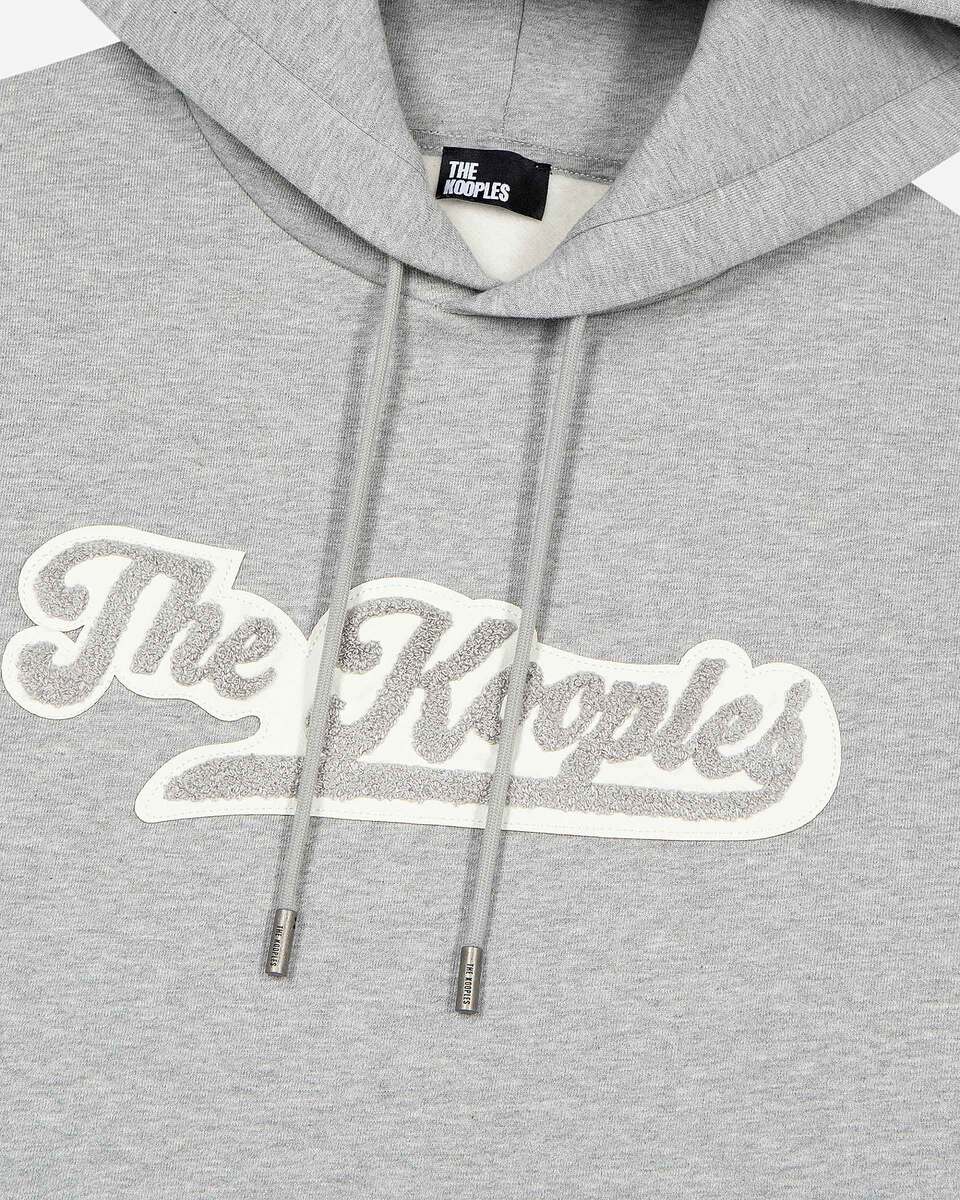 Hooded sweatshirt with grey patch