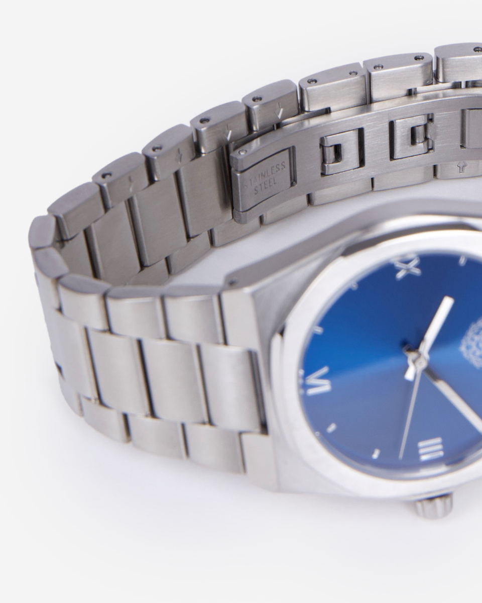 Watch with silver blazon blue dial