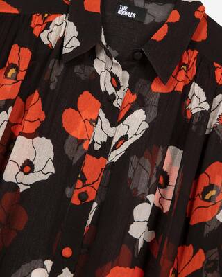 Loose-fitting black floral print shirt