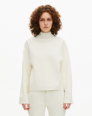 White mock-neck sweater