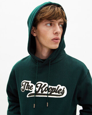 Hooded sweatshirt with dark green patch