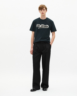 T-shirt with dark green patch