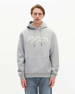 Hooded sweatshirt with grey patch