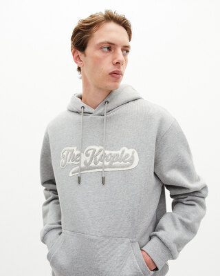 Hooded sweatshirt with grey patch