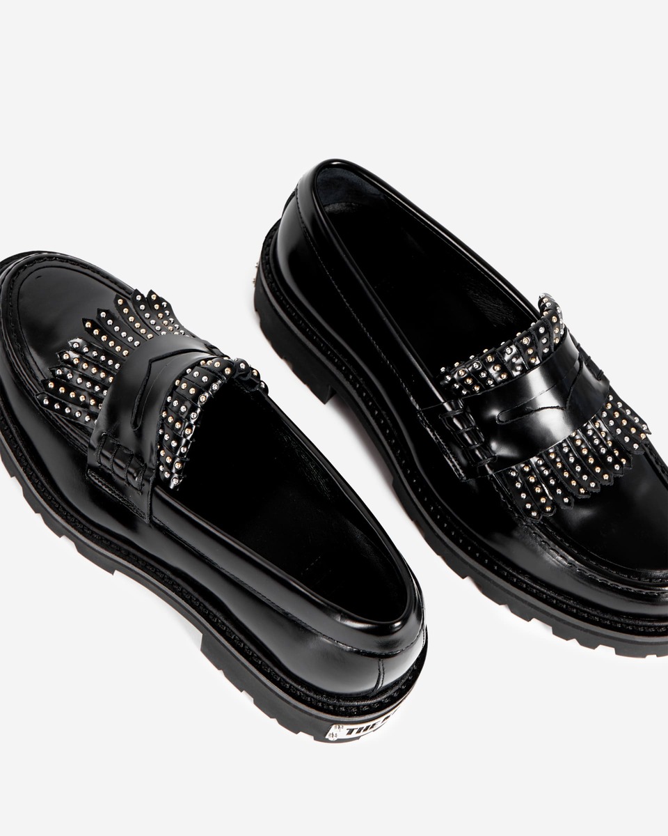 Penny loafers in black leather with fringes and studs