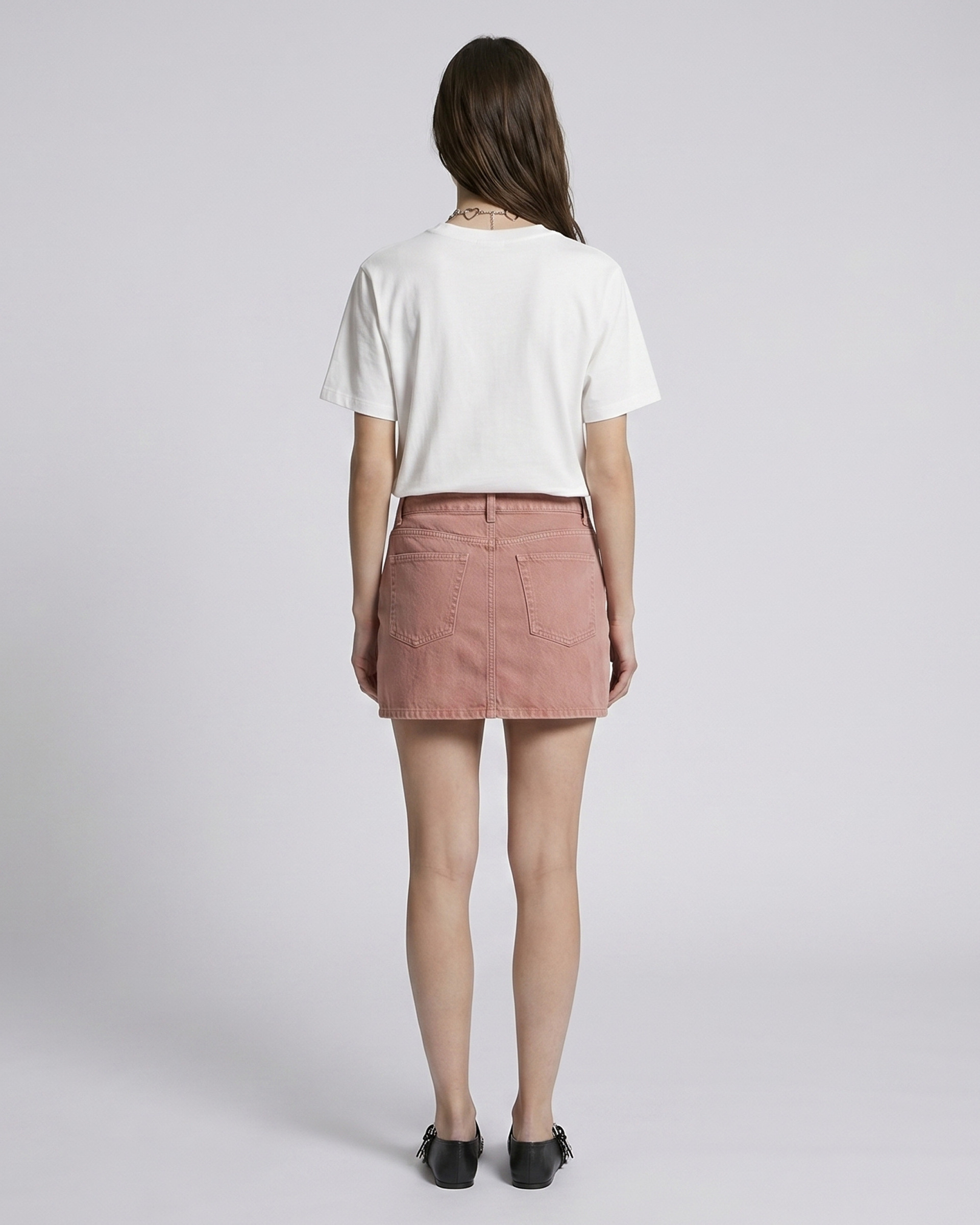 Short pink denim skirt