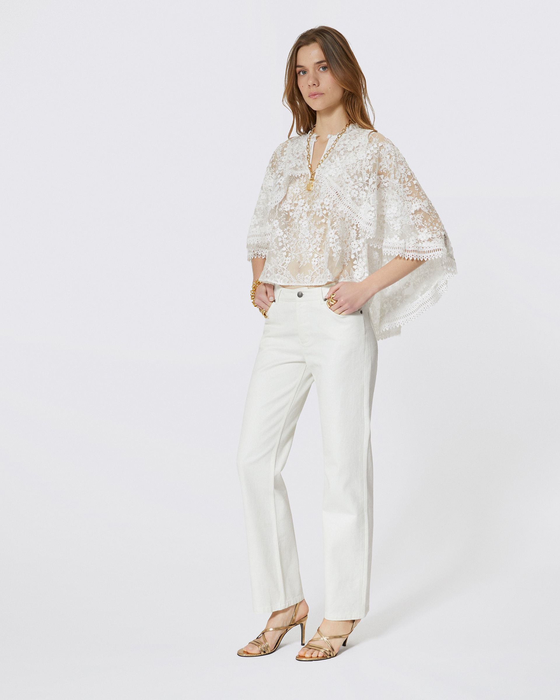 Top with ecru lace cape