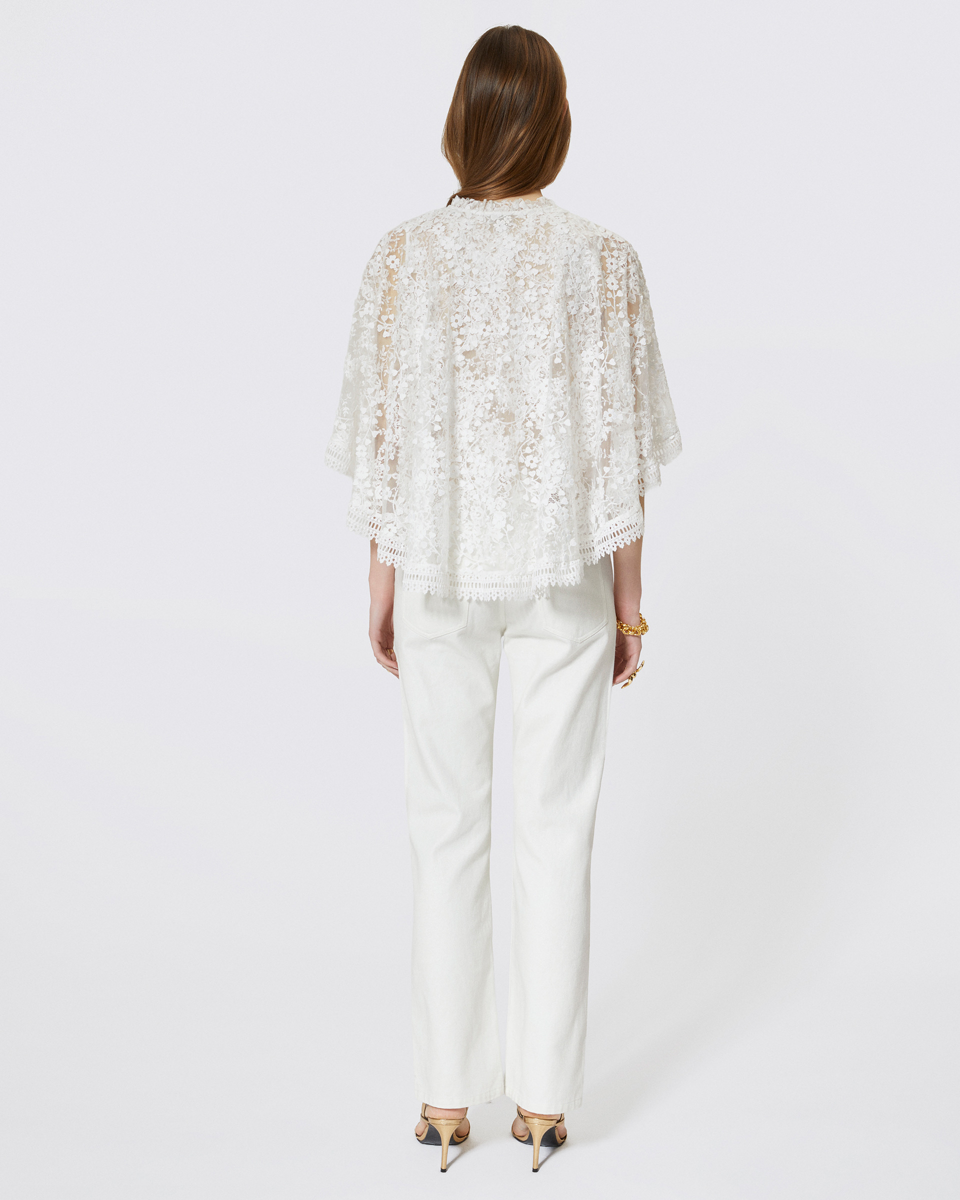 Top with ecru lace cape