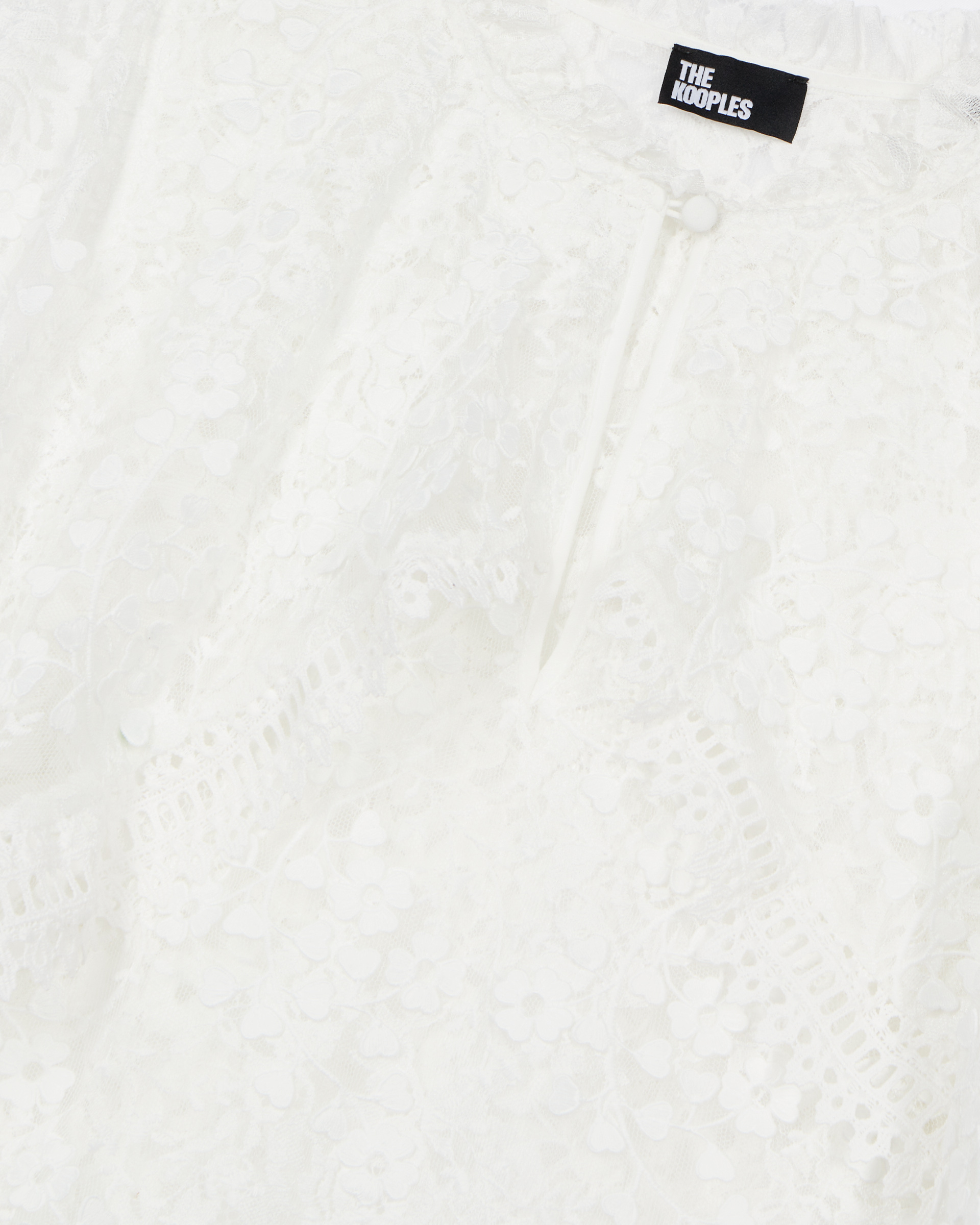 Top with ecru lace cape