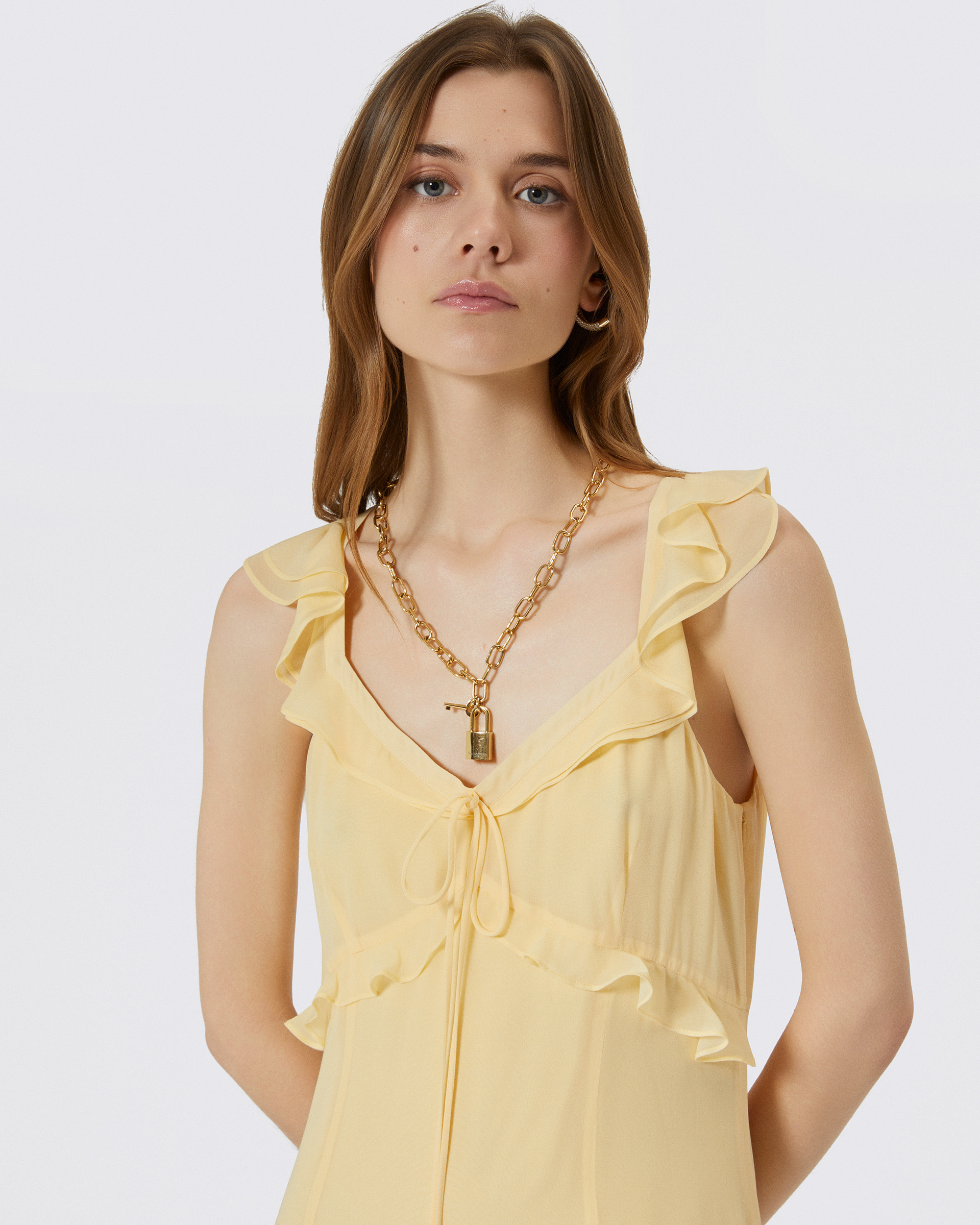 Long yellow ruffled dress