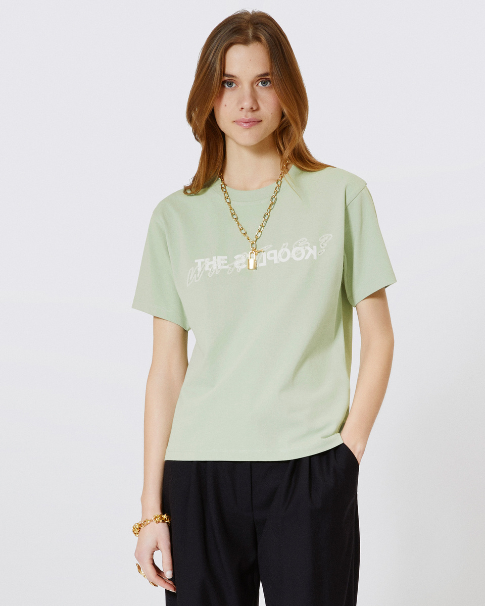 'What Is' T-shirt with green rhinestones