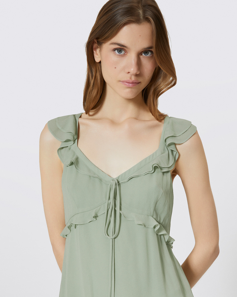 Green ruffled top