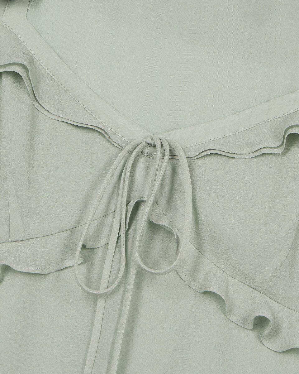 Green ruffled top