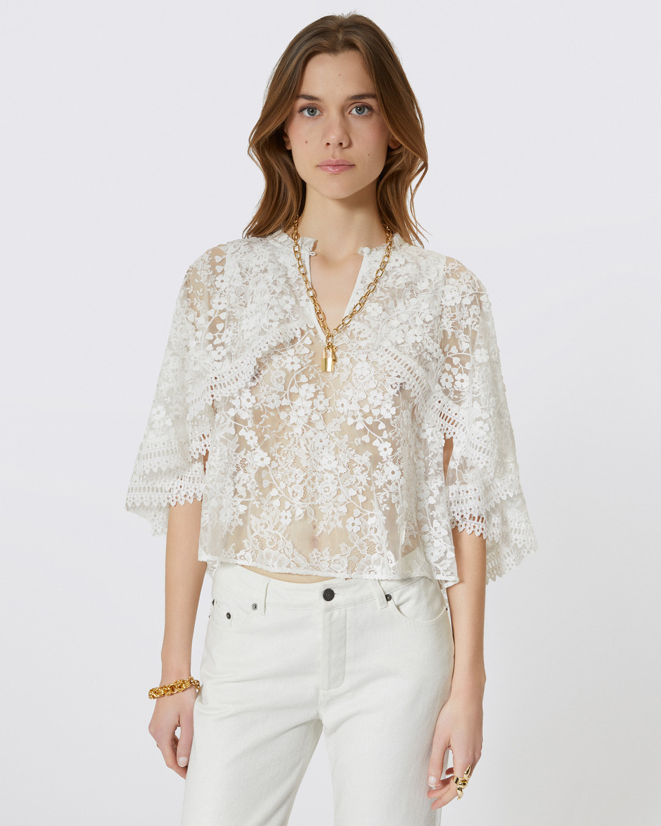 Top with ecru lace cape