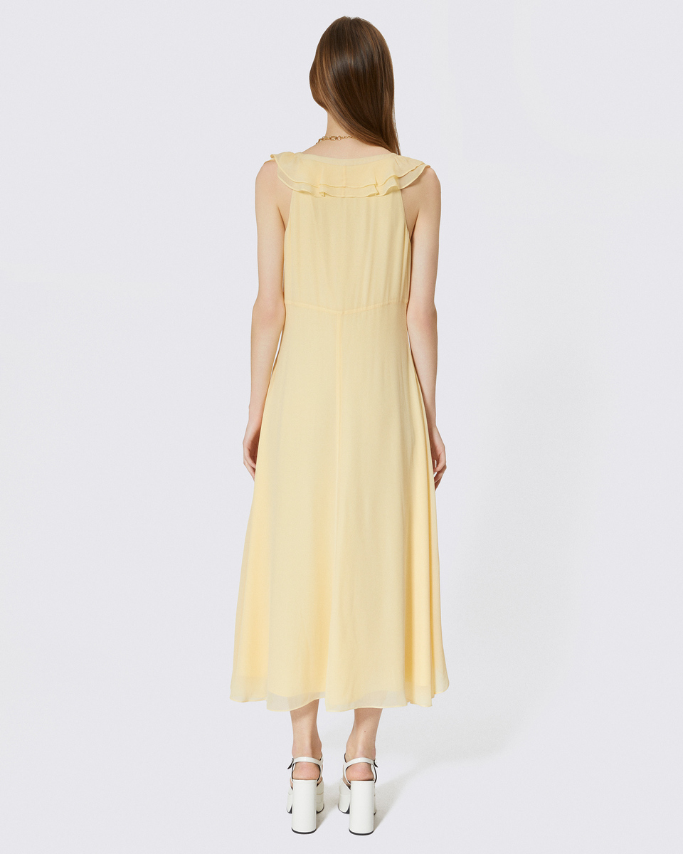 Long yellow ruffled dress