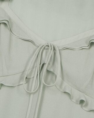Green ruffled top
